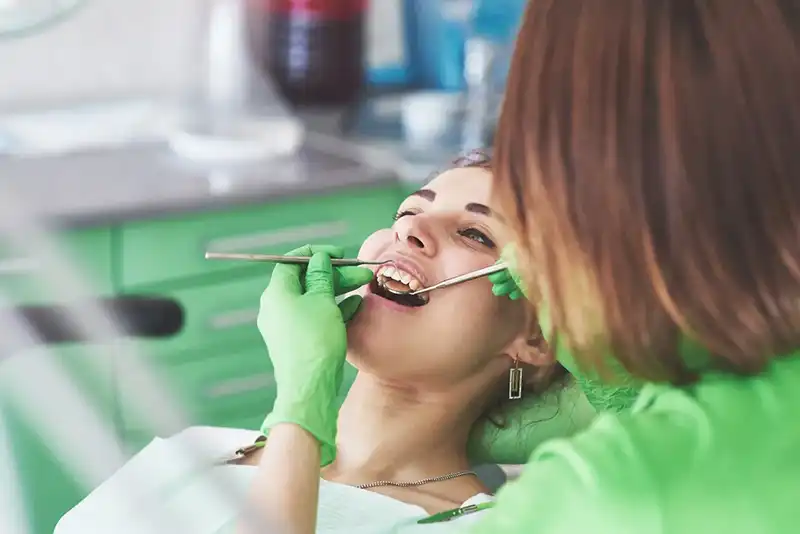 Woman getting a dental cleaning
